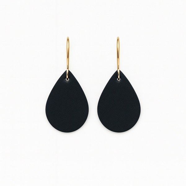 Black leather teardrop earrings with gold-plated stainless steel hooks on a white background.
