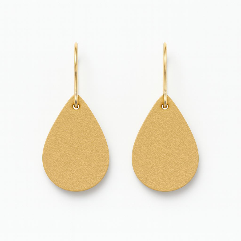 Yellow leather teardrop earrings with gold-plated stainless steel hooks on a white background.