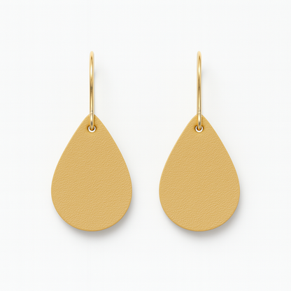 Yellow leather teardrop earrings with gold-plated stainless steel hooks on a white background.